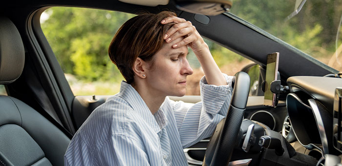 patient with headaches needing auto accident chiropractor in McKinney