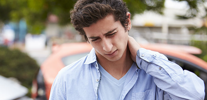 patient with pinched nerve needing auto accident chiropractor in McKinney