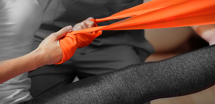 patient getting therapeutic exercise for auto accident injury in McKinney