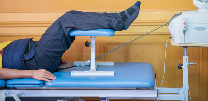 patient receiving traction therapy in McKinney for auto accident injury recovery