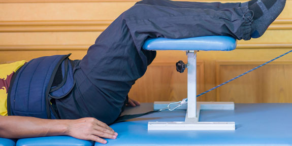 patient getting Traction Therapy for auto accident injury in McKinney
